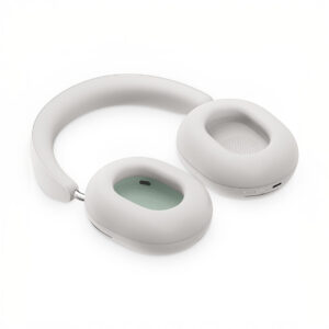 Modern white headphones on white background.