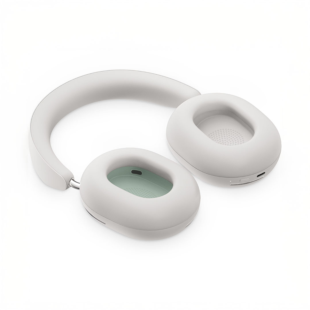 Modern white headphones on white background.
