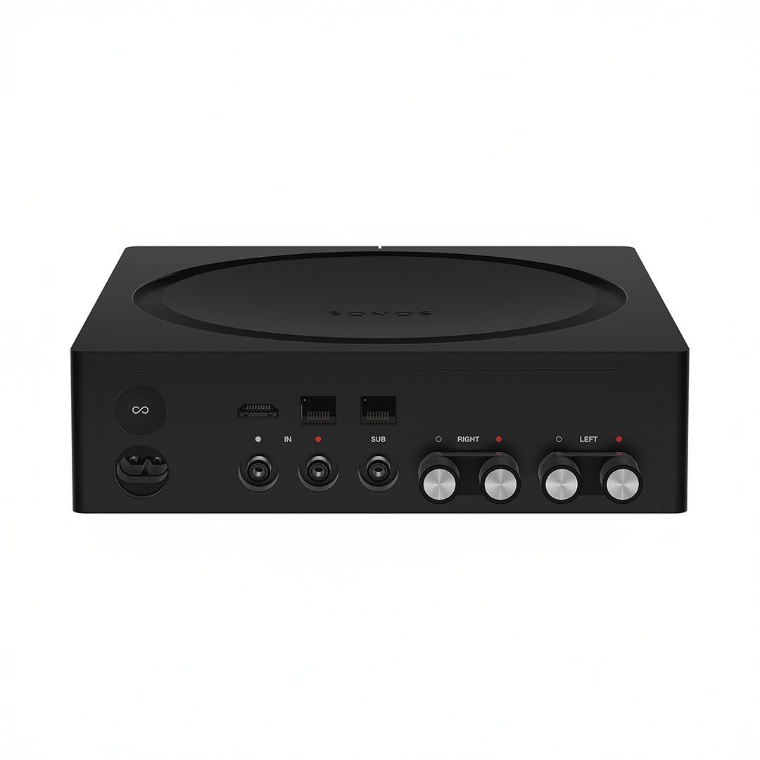 Black audio amplifier with various inputs and knobs.