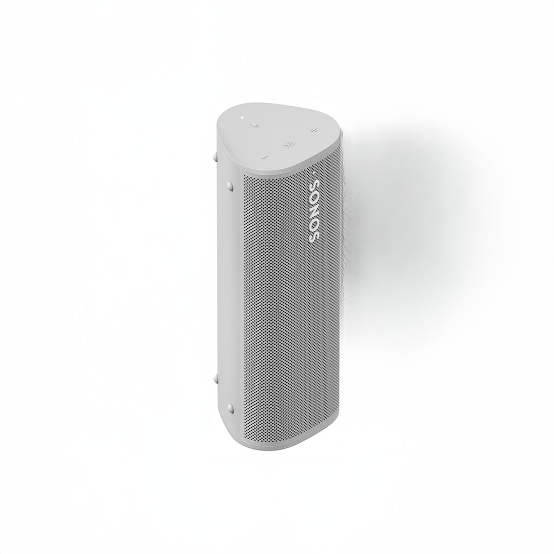 White wall-mounted speaker, sleek and modern design.