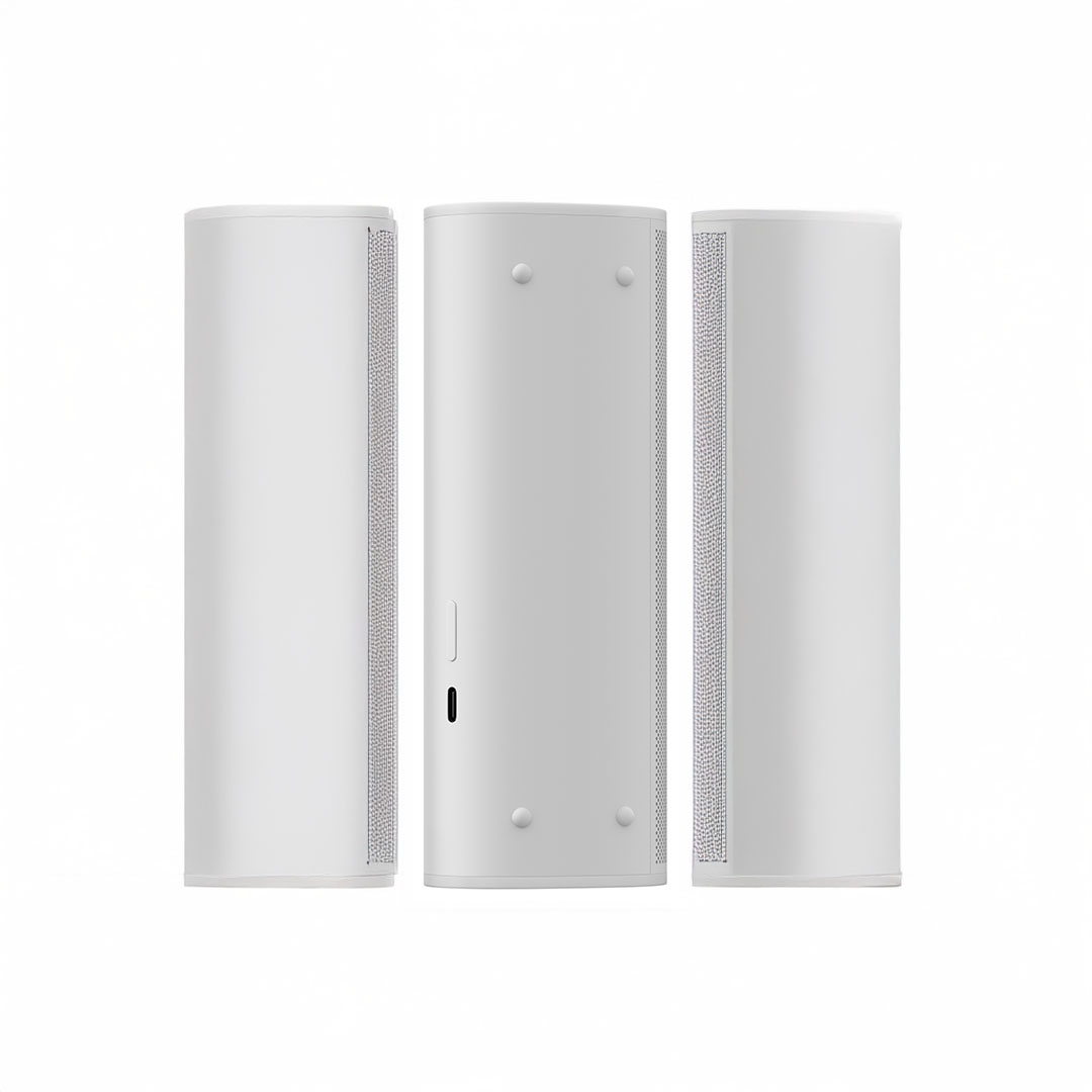 Three white tower speakers on display