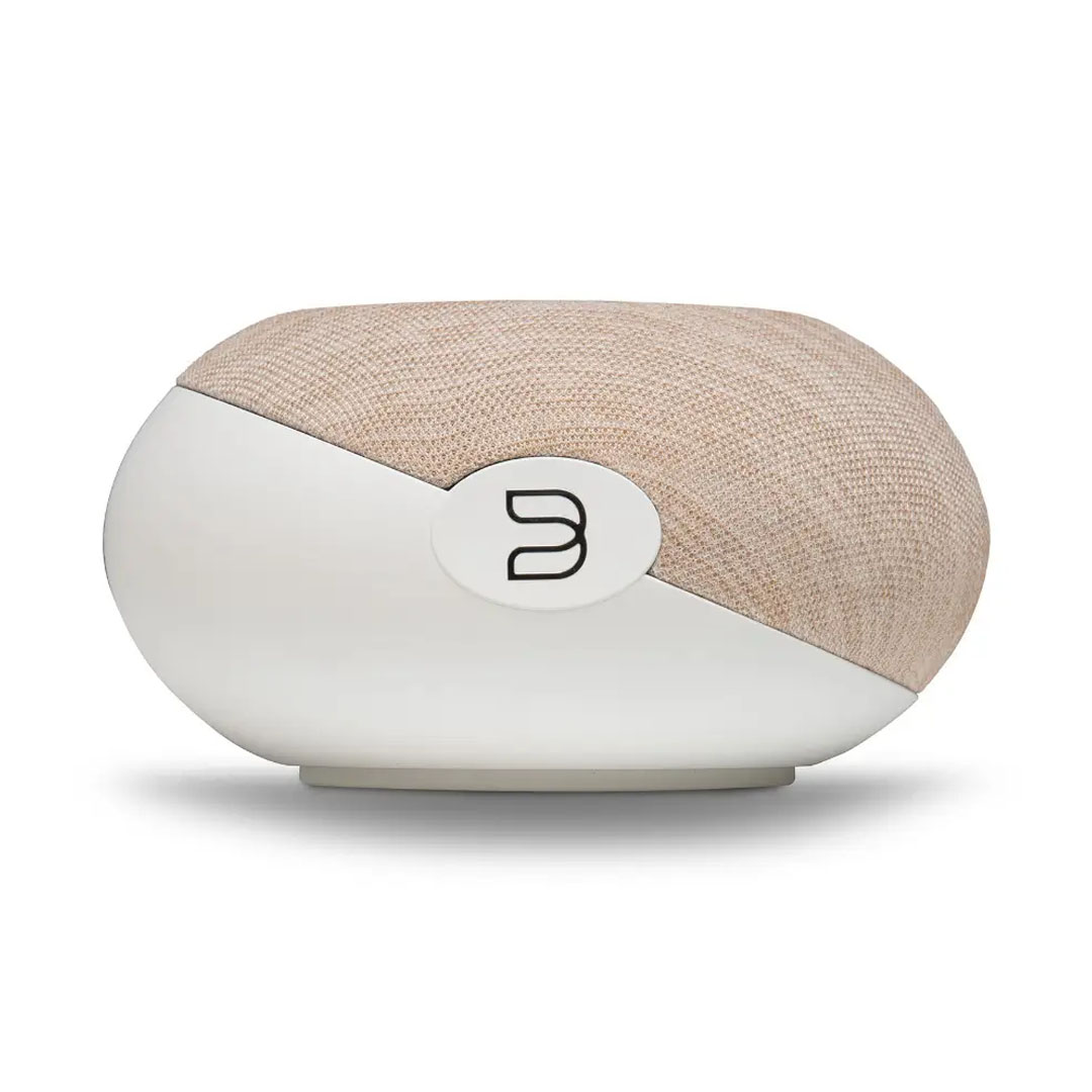 Modern speaker with fabric top, sleek design.