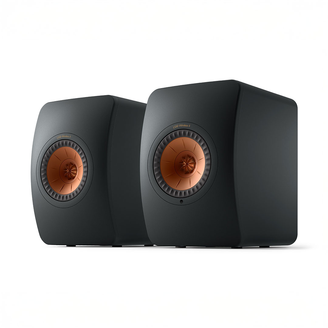Black wireless speakers with copper accents
