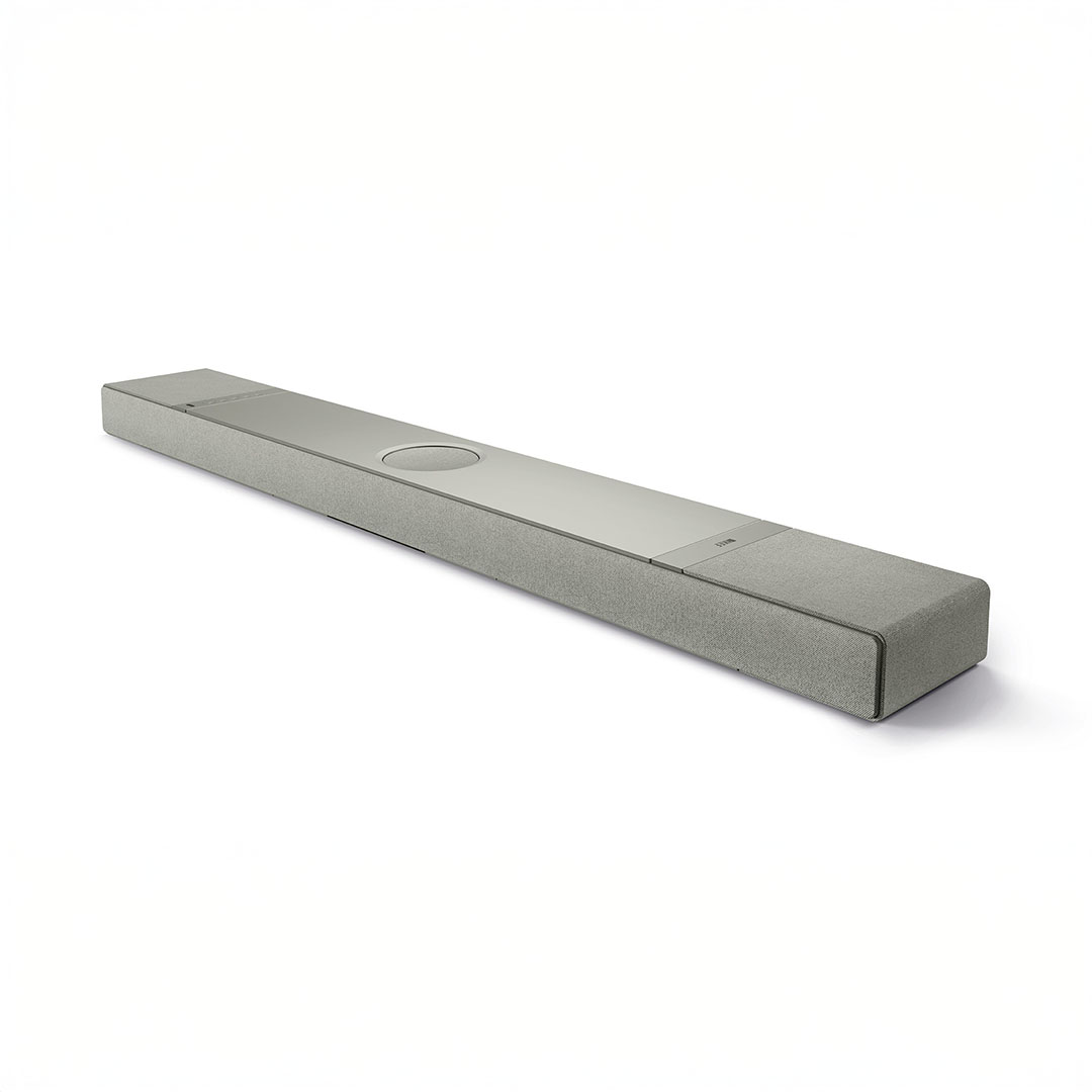 Modern gray soundbar on white background.