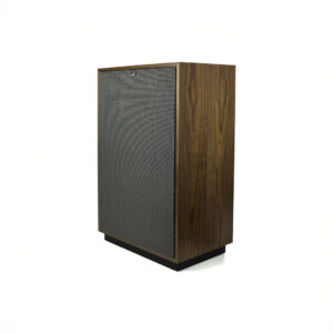 Vintage wooden speaker with mesh front panel.
