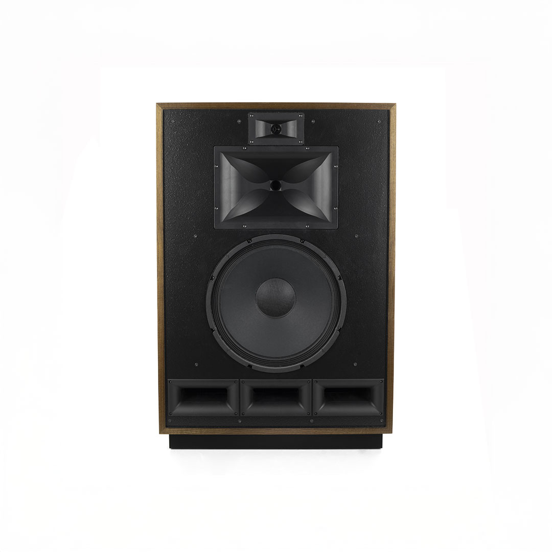 Large black audio speaker with wooden frame.