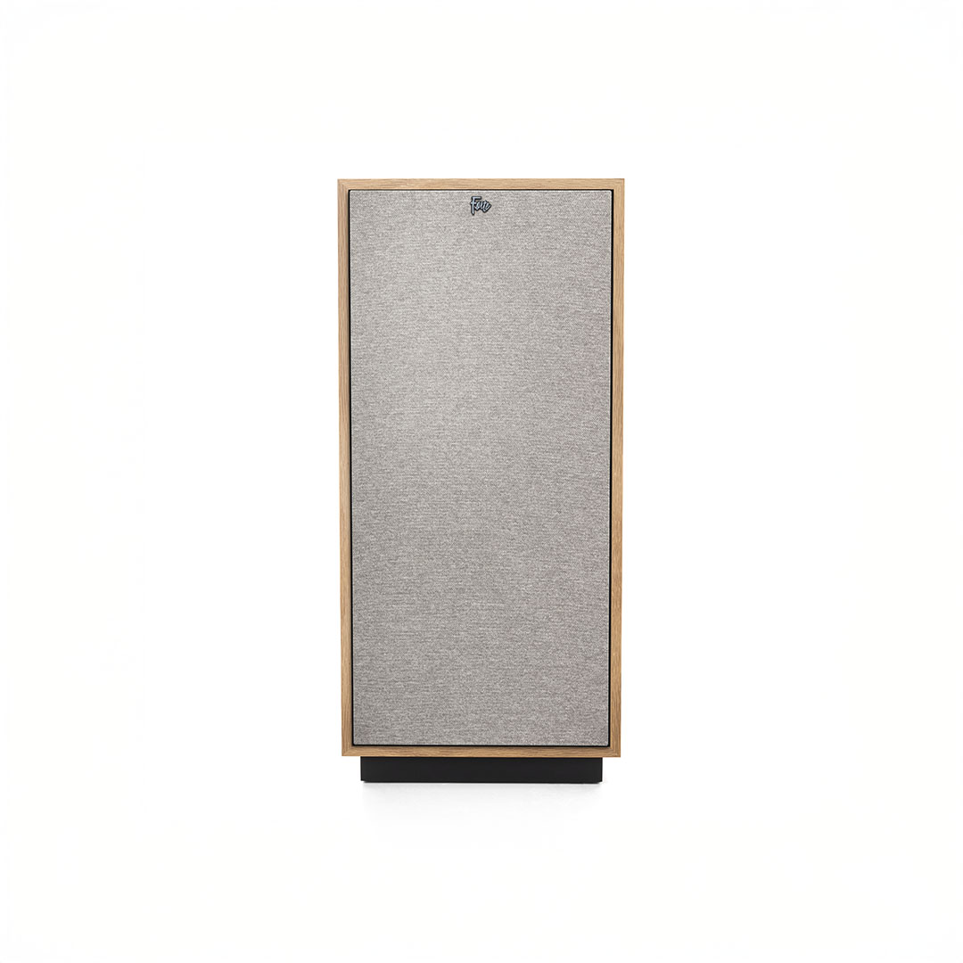 Vintage speaker with wooden frame and gray fabric.