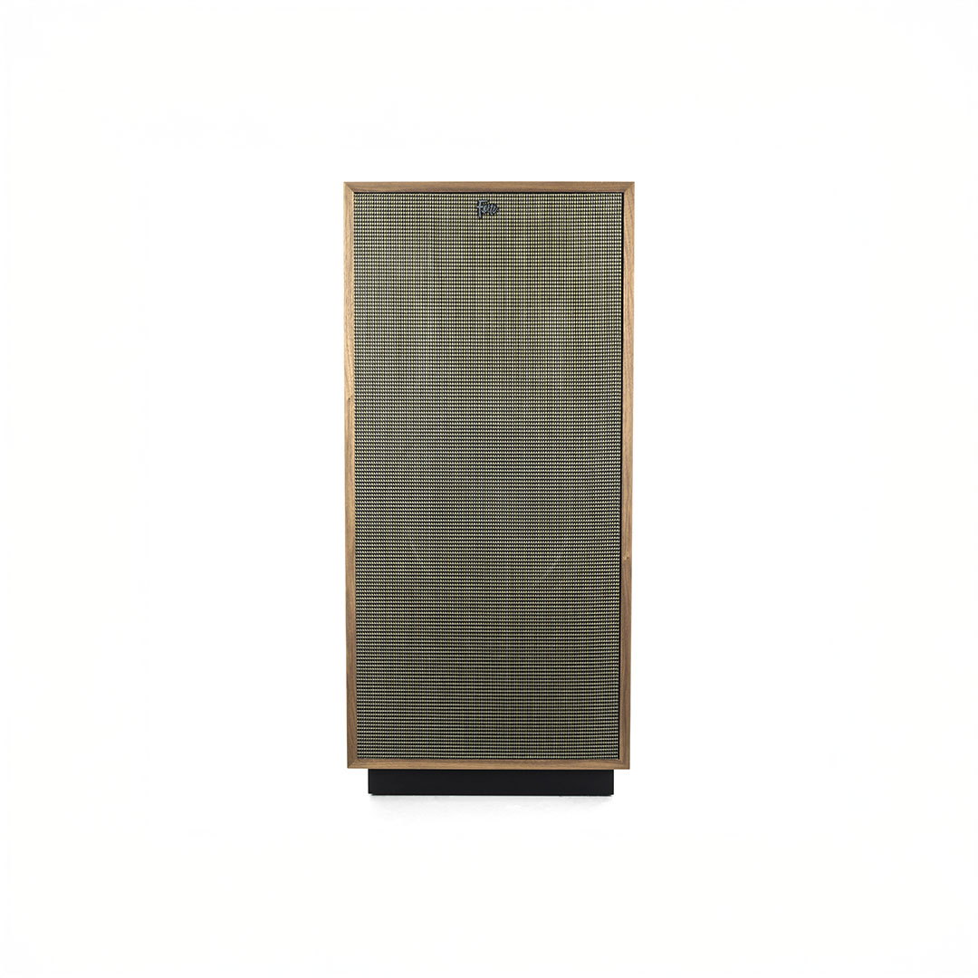 Vintage wooden speaker with mesh front panel.