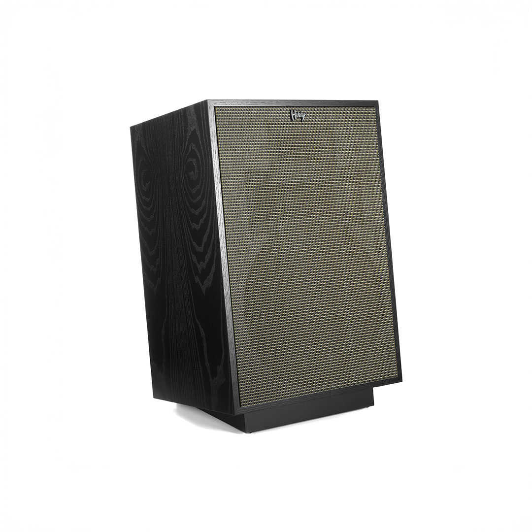 Black wood grain speaker standing upright