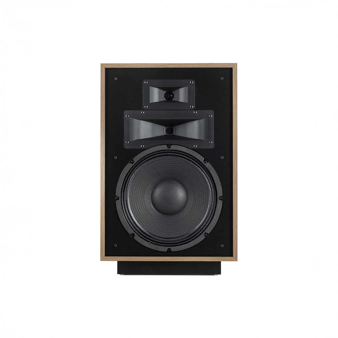 Vintage wooden speaker with large woofer.