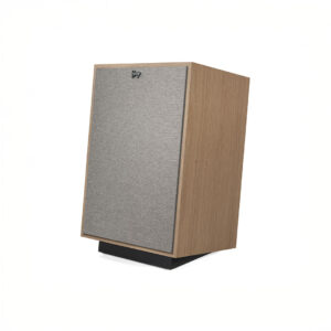 Vintage speaker with wooden finish and fabric cover.