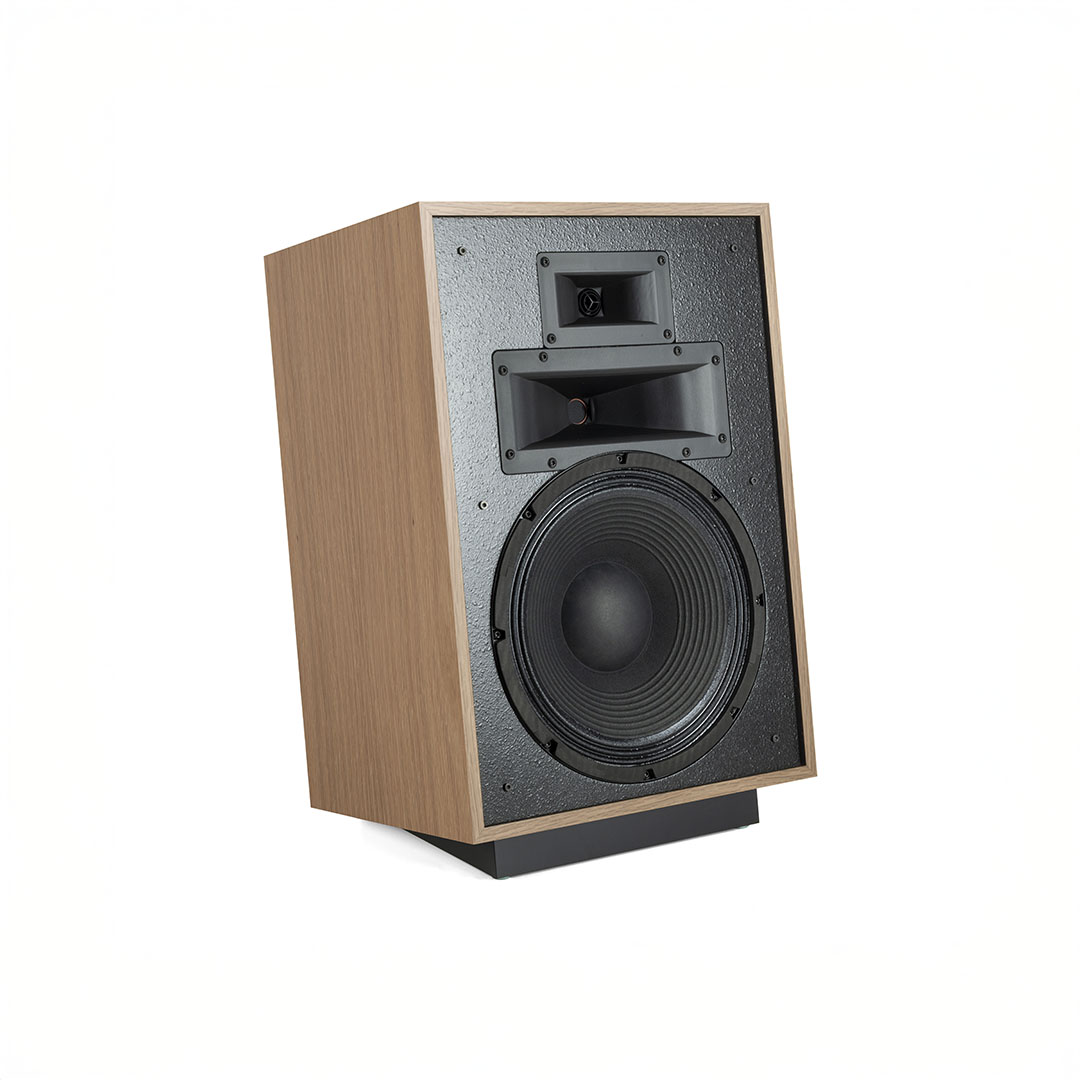 Wooden bookshelf speaker with black front panel.